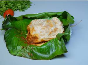 Chicken kizhi Porotta 