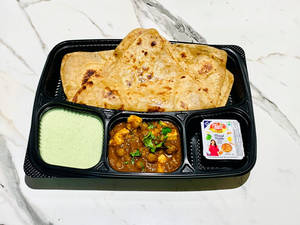 2 Tawa Plain Paratha With Chana.
