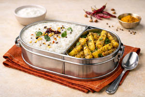 Curd rice with aloo bhujiya bowl