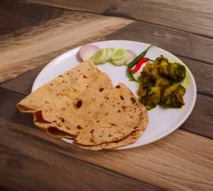 Jeera aloo + 4 Butter roti + salad