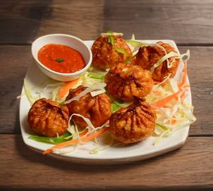 Fried Chicken Momos Half [7pic] served with butter, chutney and mayonnaise