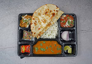 Punjabi Thali + Coke 250 ml pet Bottle