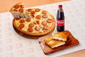 Any Medium Non-Veg Pizza + Garlic Bread + Bevarage at 529