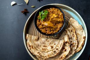 Handi ka Bhuna Murgh & Laccha Paratha