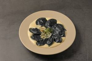 Mushroom Ravioli In Truffle Cheese Sauce