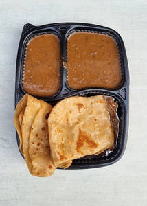 Dal Makhani + 2 Plain Parathas And Salad