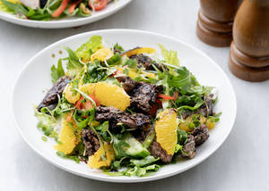Sliced Tenderloin Salad With Arugula In Orange Mustard Vinaigrette