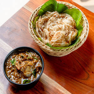 Malabar Parotta & Achayathi Kozhi Curry