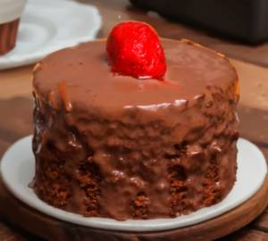 Fudgy Rich Chocolate Cake with warm Chocolate