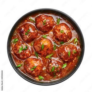 Veg Dumplings In Coriander Sauce