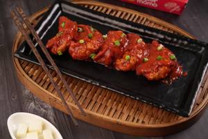 Paneer Tikka Pan Fried Momo in Schezwan