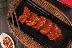 Peri peri Chicken Pan Fried Momo in Chilli Garlic