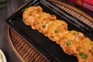 Chicken Cheese Pan Fried Momo in Butter Masala