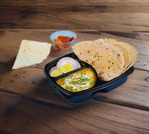 Dal Tadka 250Ml With 2 butter Tawa Roti 