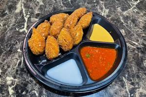 Veg kurkure momos