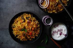 Veg Dum Biryani (served With Raita)