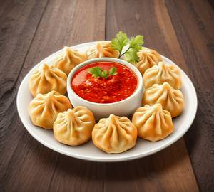 Steamed momos with dip