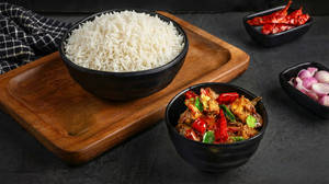 White Rice With Nattu Kozhi Chinthamani Varuval