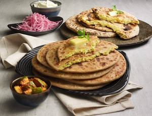 Mix Veg Paratha With Raita, Pickle & Papad