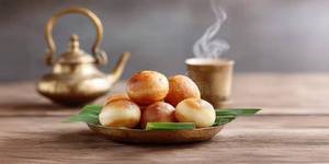 Parcel tea + Ghee Paniyaram [4Pcs]