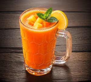 Fresh Carrot , Pineapple, Ginger And Lemon Mix Juice