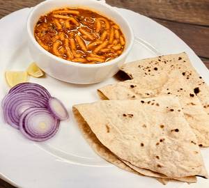 4 Rotis With Sev Tamatar Sabji