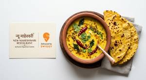 Rajasthani Kadhi with 2 Makka Roti