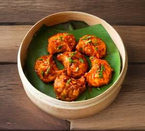 Chicken Achaari Momos (8 Pieces)