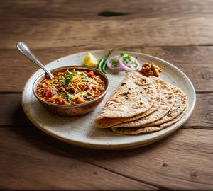 Sev tamatar with roti