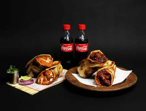 Malai Chaap Roll + Chaap Butter Masala Roll + 2 Coke (250 Ml)