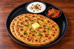 Aloo paratha with dahi and pickle