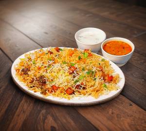 Veg Biryani With Salan, Raita, Salad & Chutney