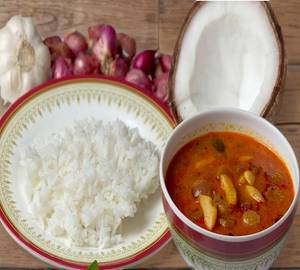 White rice with vathal kolambu