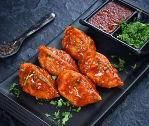 Chicken Schezwan Momos [8 Pieces]