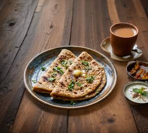 Ginger Tea + 2 pcs aloo onion paratha
