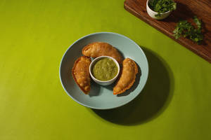 Beef Cheeks And Corn  Empanadas