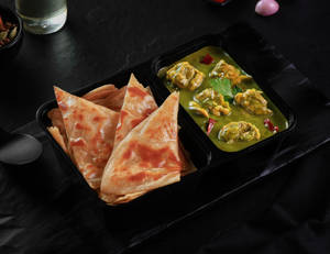 Singh Da Saag Chicken Paratha Bowl.
