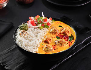 Punjabi Kadhi Pakoda Rice Bowl.