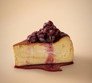 Basque Cheesecake Slice With Amaretto Cherries