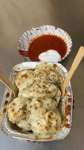 Veg Baked Pizza Momos