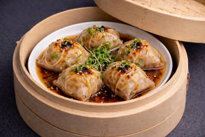 Poached Chilli Veg Dumplings