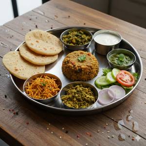 4 Plain Roti+[half] Hari Sabji+aloo Bhujiya+hari Bhujiya+ Chokha+green Salad+chutney