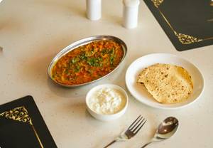 Tadka Khichdi + Raita + Salad + Papad