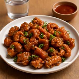 Schezwan Tossed Crispy Mushroom And Babycorn