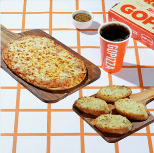 Margharita Pizza + Cheese garlic bread + Pepsi