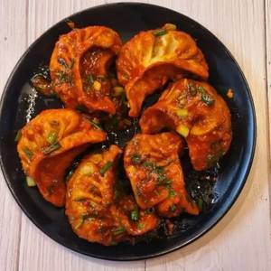 Veg. schezwan momos (6 pcs)