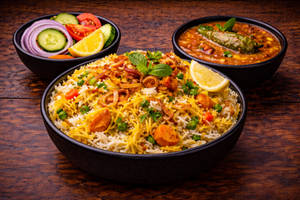 Veg Dum Biryani (small),raita,gravy Salan,salad