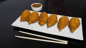 Veg Exotic Kurkure Momo 6 Pcs