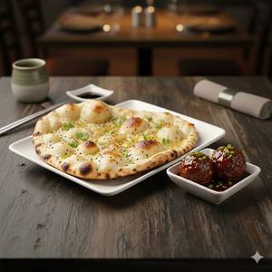 Manchurian (2 Pc) + Butter Naan (1 Pc)
