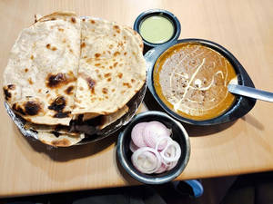 Dal Makhni & 2 Butter Roti.